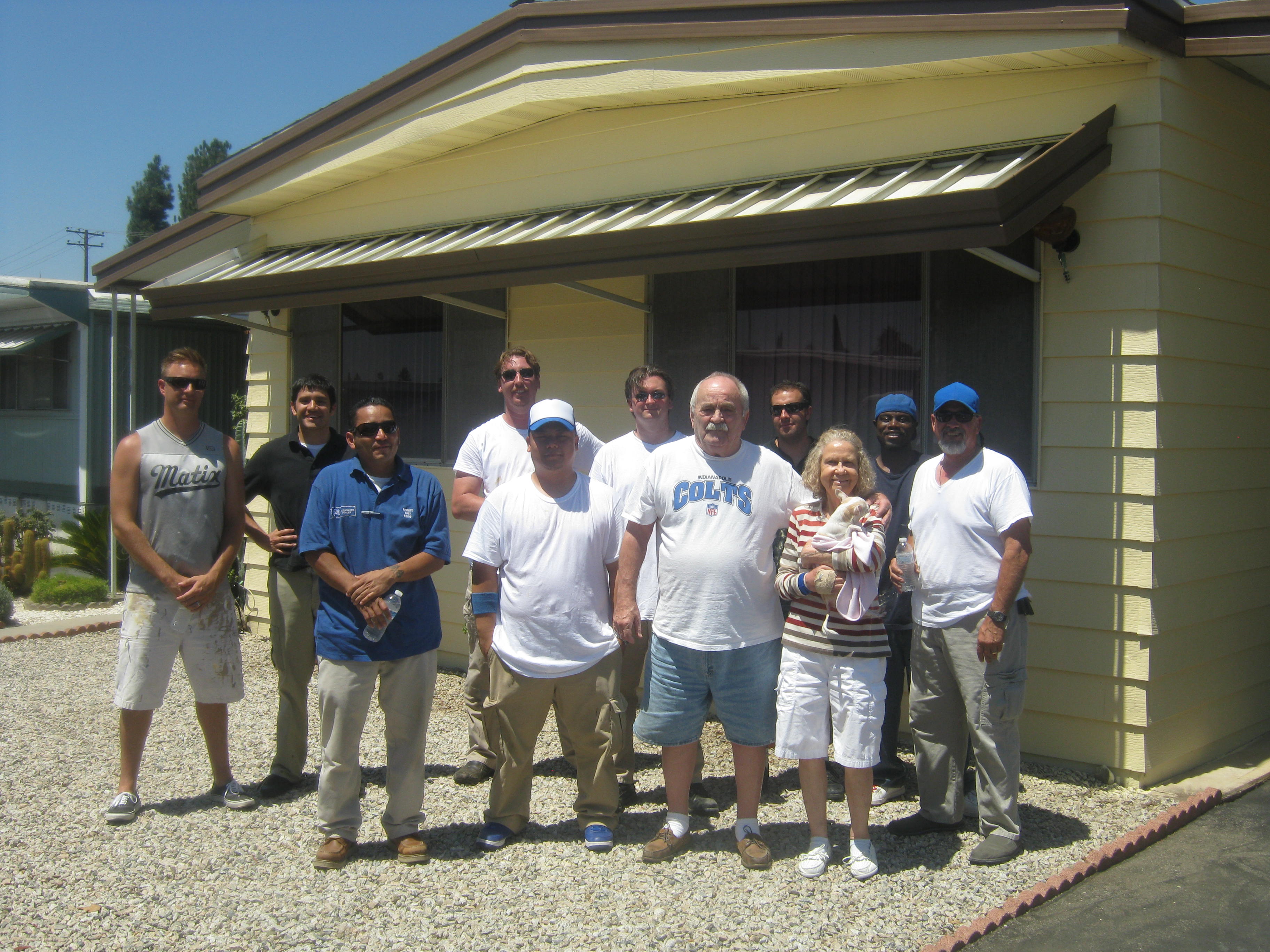 8/14/12: Defender Direct Group Photo with Mobile Home Owner