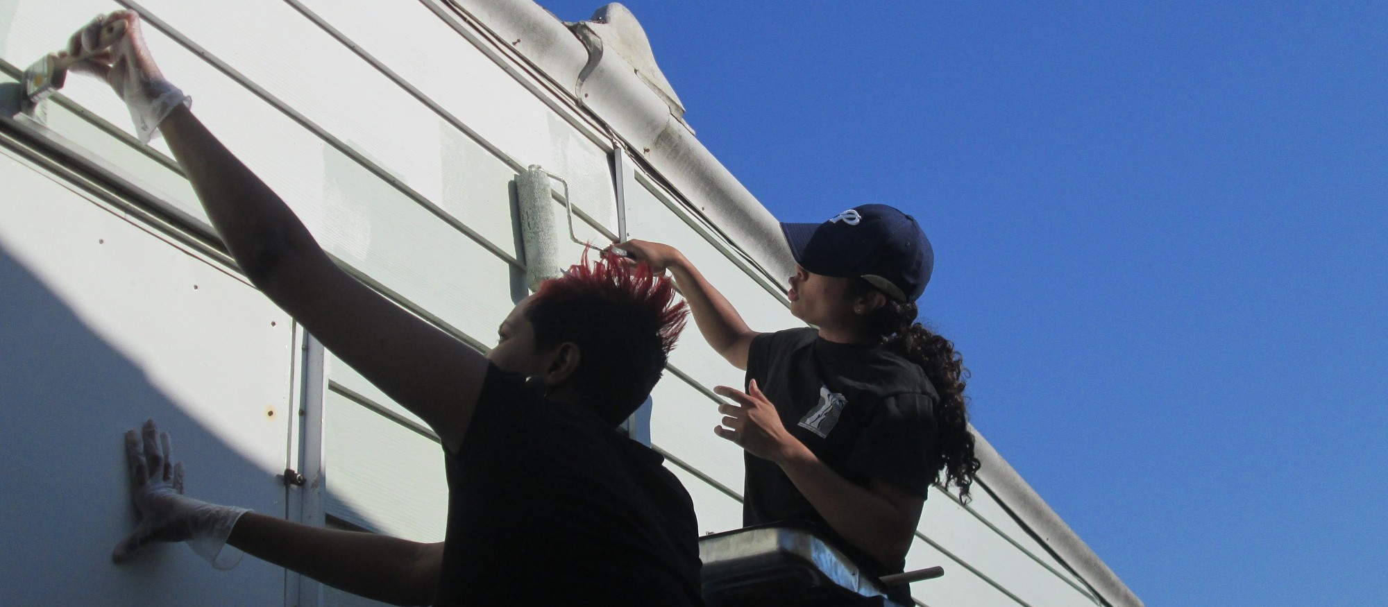 Volunteers reaching out... Quite Literally