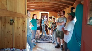 The Flatirons crew gathering and listening to the damages the Colorado floods caused in the James Town area.